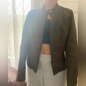 maurice’s brown leather jacket